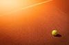 close-up photograph of tennis ball on the court